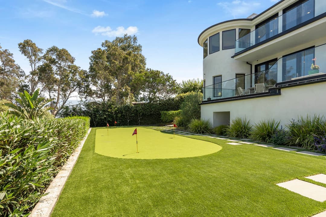 Residential backyard putting green design inspiration
